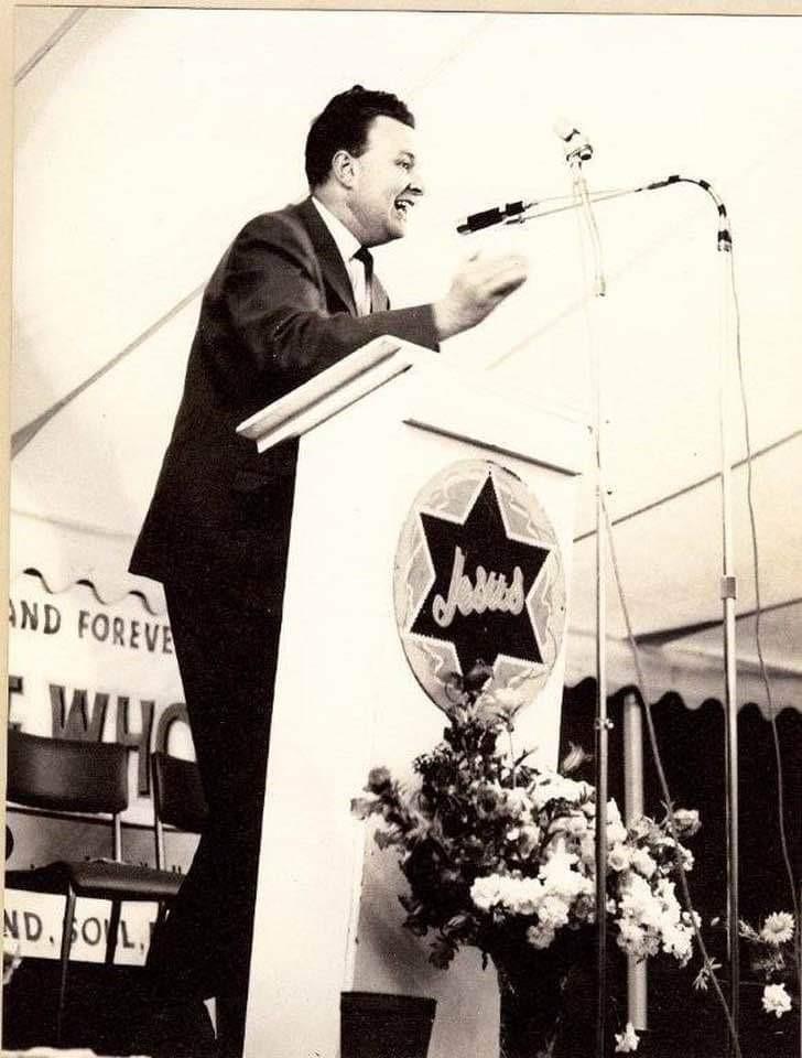 Evangelist Don Double preaching at a Good News Crusade